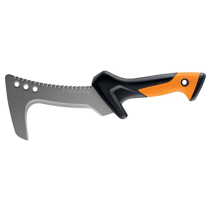 a fiskars brush axe with a gray serrated blade and a black and orange handle. the blade has a hook at the end and several holes, and the handle has a hole for hanging.