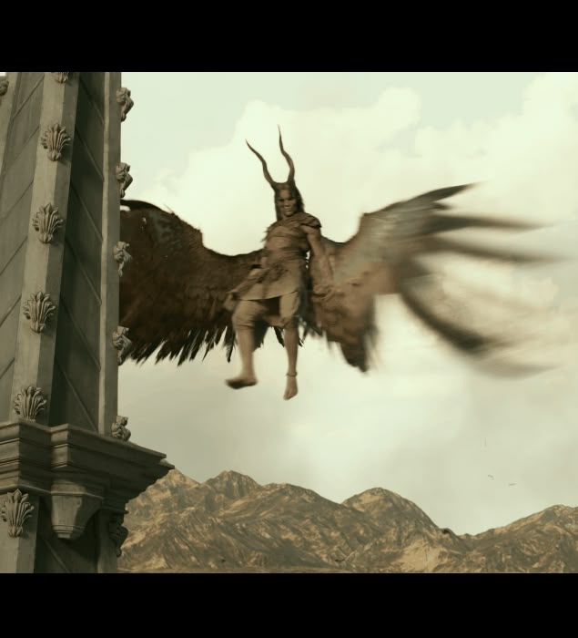 a blurred image of a winged mythological creature with horns, possibly a demon or a fallen angel, flying outdoors in front of a mountain range and part of a building. the creature is in motion, suggested by the blurring of its wings. the sky is cloudy.