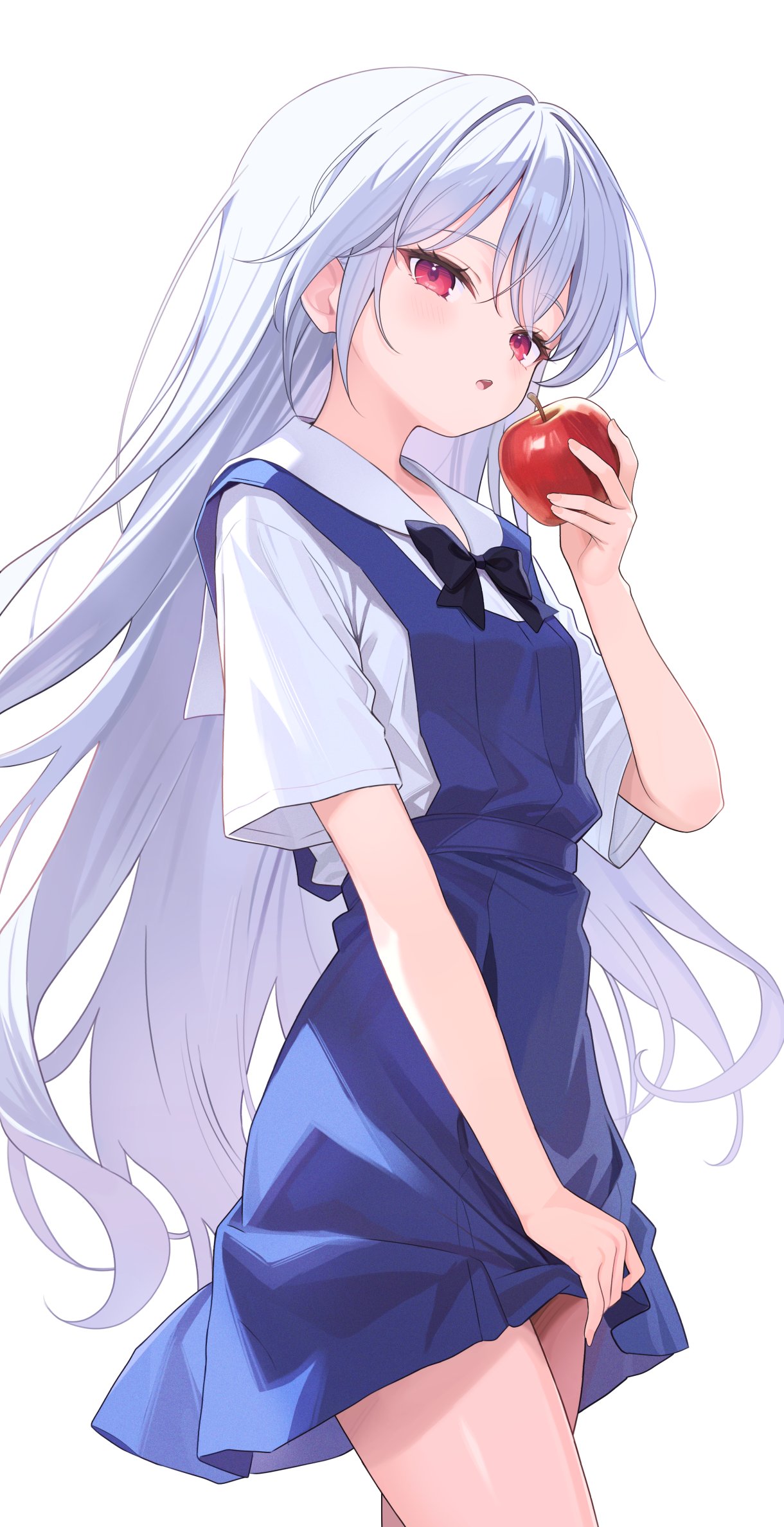 an anime girl with white hair and red eyes is holding a red apple. she is wearing a school uniform consisting of a white shortsleeved shirt, a blue apron, and a black bow tie. the girl is standing and part of her legs are visible.