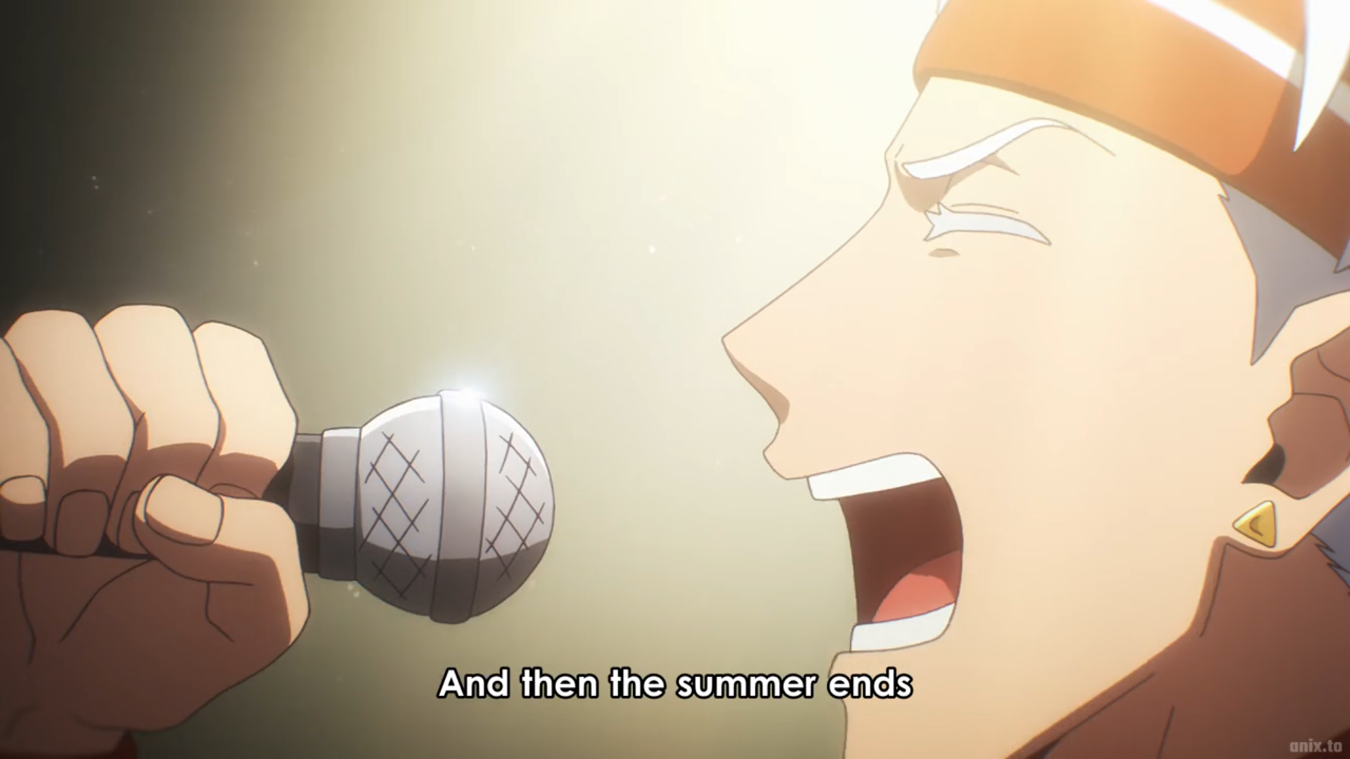 a man with white hair and an orange headband sings into a microphone on a brightly lit stage. the text "and then the summer ends" is displayed at the bottom of the image.