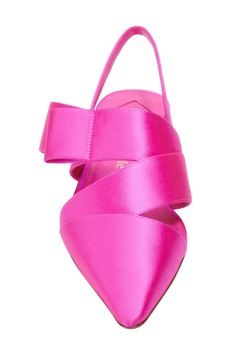 a pair of bright pink satin slingback heels with a bow detail.  the shoes are pointed toe and have a high heel. the shoes are a fashionable and elegant choice for a summer party or special occasion.