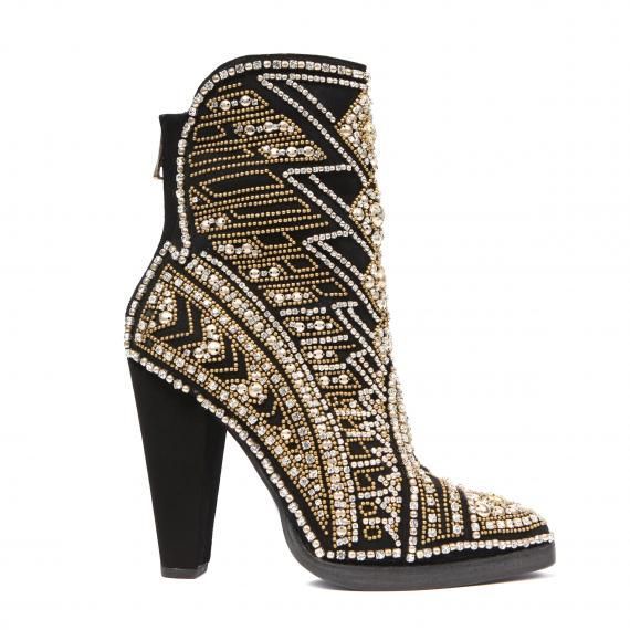 a pair of black high heeled ankle boots with gold and silver rhinestones covering the entire shoe. the boots are made of suede and have a pointed toe.