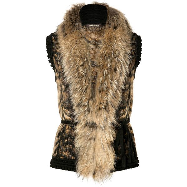 a women's brown and black furcollared knit vest. the vest is sleeveless and has a wide, furry collar that falls down the front of the vest. the vest is belted at the waist. the vest is made of a knit wool fabric. it is a classic winter fashion piece that is both stylish and warm.