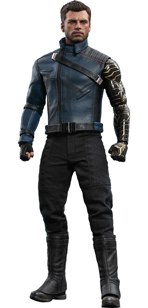 this is a full body shot of a 1/6 scale action figure of bucky barnes, the winter soldier from marvel's cinematic universe.  the figure is highly detailed, showing bucky in his dark blue jacket, black pants, and signature black boots. his metallic prosthetic arm is prominently displayed. the figure is posed in a standing position against a white background.