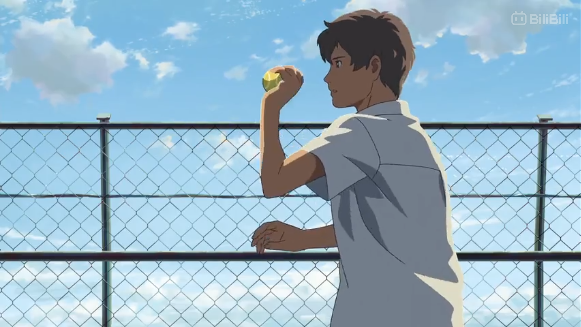 an anime drawing of a boy in a white shortsleeved shirt standing near a fence and holding a yellow tennis ball in his right hand. the sky is blue with a few white clouds.