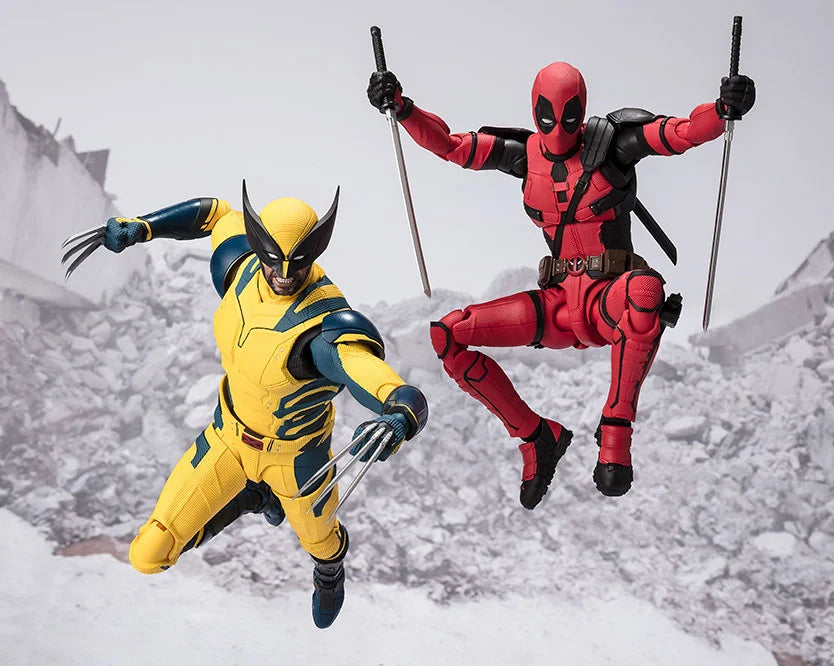two action figures, wolverine and deadpool, are posed midair against a backdrop of snowy rubble. wolverine, in his yellow and blue suit, lunges forward with his claws extended. deadpool, in his red and black suit, is caught in a dynamic pose, katanas in hand. the lighting is bright, highlighting the figures against the white background. the low angle perspective emphasizes the action and power of the scene.