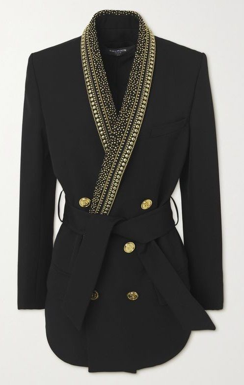 a black, wrapstyle blazer with beaded trim on the lapels and a matching fabric belt.