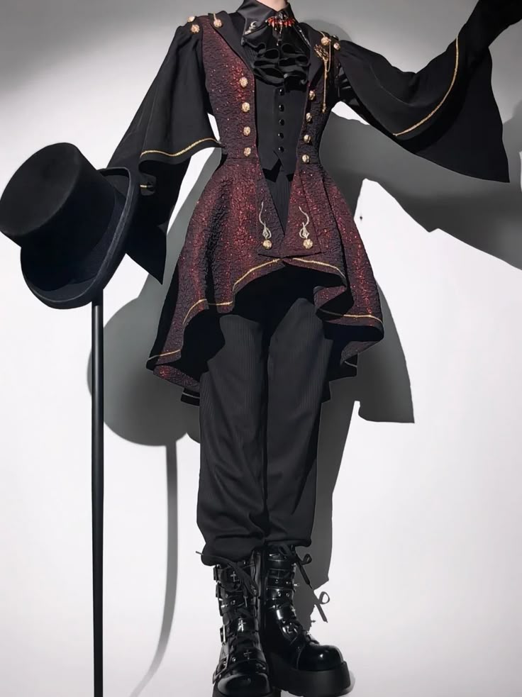 a person in a dramatic victorianinspired outfit, featuring a longsleeved black shirt with gold trim, a burgundy and goldtrimmed jacket with ruffles, black dress pants, and black platform boots. they are holding a black top hat on a stand. the outfit is theatrical and detailed.