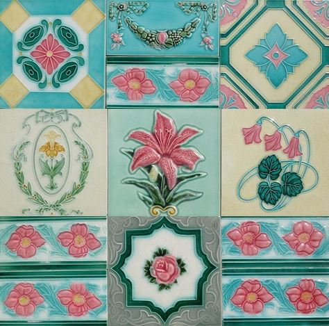 a closeup shot of a collection of vintage ceramic tiles showcasing a variety of floral designs. the tiles are arranged in a grid pattern, each tile featuring a different floral motif. the colors are predominantly pink, green, and cream, with accents of blue. the flowers are depicted in a style reminiscent of art nouveau or art deco, with some tiles featuring raised, threedimensional details. the overall effect is one of elegance and sophistication, suggesting a historical or antique context. the tiles appear to be in good condition, with vibrant colors and sharp details. they would likely be highly prized by collectors of antique or vintage home décor items.
