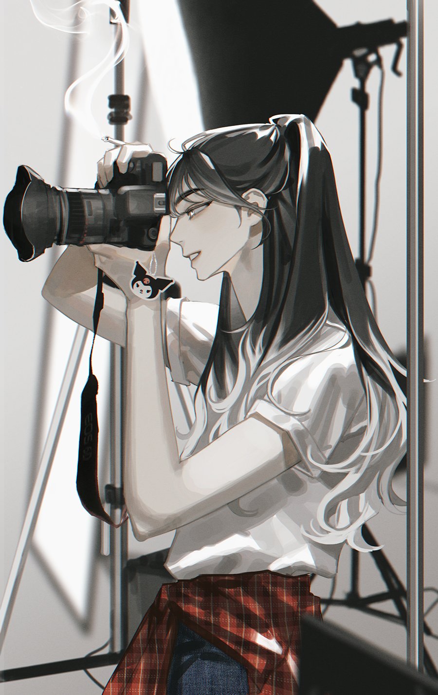 the image is a digital illustration of an animestyle young woman, appearing to be a photographer. she's seen in profile, holding a dslr camera to her eye, engrossed in taking a photograph. the setting appears to be a professional photography studio, with lighting equipment visible in the background.  the overall color scheme is grayscale with hints of muted tones, creating a moody and slightly melancholic atmosphere. the girl is dressed casually in a white tshirt and plaid shirt tied around her waist, and has long dark hair styled in a ponytail. a small kuromi charm is visible on her wrist. the focus is sharply on the girl and her camera, with the background subtly blurred to emphasize the subject. the style is reminiscent of contemporary digital illustrations with a focus on atmospheric rendering and detailed character design.
