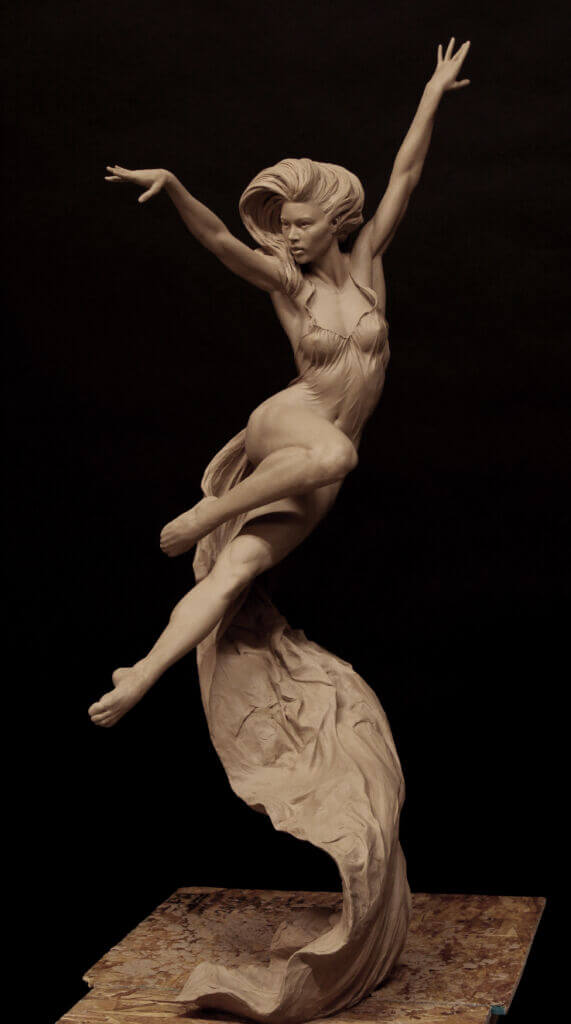 this is a clay sculpture of a woman dancing. she is captured midleap, her body arching gracefully. a flowing fabric trails behind her, adding to the sense of movement. the sculpture is set against a black background, which emphasizes the form and texture of the clay. the lighting is soft and directional, highlighting the contours of the woman's body and the flowing lines of the fabric.
