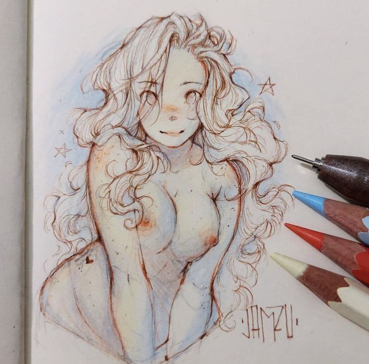 the image shows a closeup of a colored pencil drawing of a young woman.  the art style is reminiscent of anime or manga, with large eyes, soft features, and flowing, curly light brown hair. the woman is depicted from the chest up, and her pose is relaxed and slightly hunched forward.  she has light freckles scattered across her skin, and her overall appearance is soft, ethereal, and somewhat dreamy. the background is a very light blue with subtle star shapes. several sharpened colored pencils are visible in the bottom right corner of the image, suggesting the artist's process.  the artist's signature, "jamzu," is visible in the lower right. the drawing is done on a sketchbook page. the overall mood and aesthetic is light, soft, and slightly sensual.