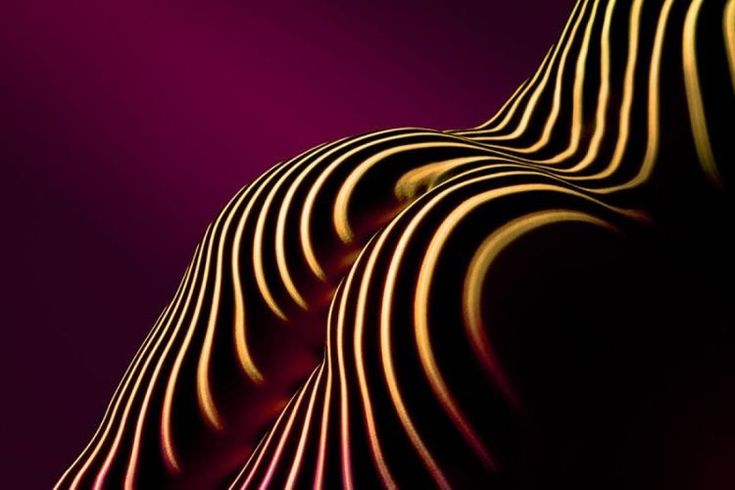 the image is an abstract photograph or digitally manipulated image of a female body. the body is not explicitly shown, but its form is suggested through a series of golden stripes and curves against a deep maroon background. the stripes create a strong visual pattern and texture, obscuring the anatomical details while emphasizing the sensual curves of the body.  the lighting creates dramatic highlights and shadows, enhancing the threedimensionality of the form. the overall effect is both elegant and suggestive.