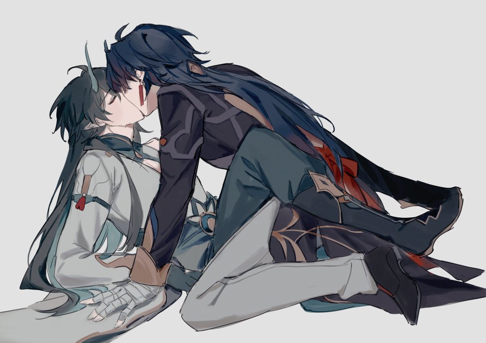 this image features two anime boys, one with black hair and the other with blue hair, in a