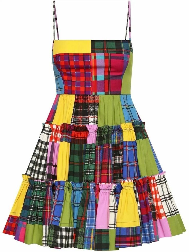 this is a colorful patchwork dress with a plaid pattern. the dress is sleeveless and has a fitted bodice with a tiered skirt. the dress is made of a variety of different fabrics, all in different shades of plaid. it has a bright and fun look for the summer.
