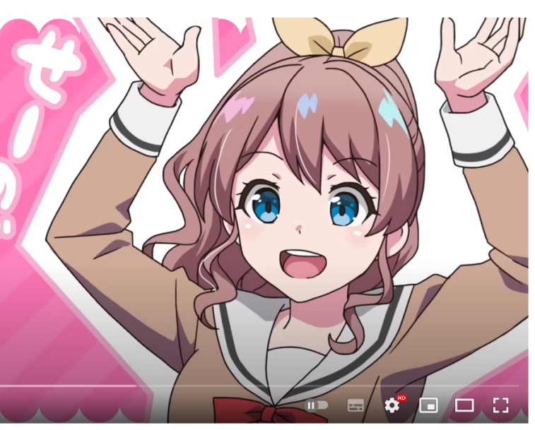 the image shows a young animated girl with brown hair and blue eyes. she is wearing a sailorstyle school uniform with a brown top and white trim. she has a yellow ribbon in her hair. the girl is depicted with her arms raised in the air and a large, cheerful smile on her face. the background is a bright pink with some white accents, further emphasizing the girl's joyful expression.