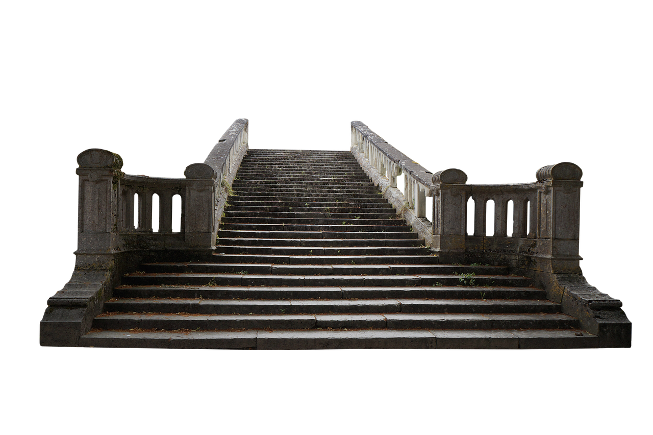 the image shows a long outdoor stone staircase with balustrades on either side. the stairs lead upward into a dark, unseen area. the architecture is classic, featuring stone railings and posts.