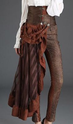 a woman models a steampunkinspired outfit. the focus is on the intricately designed pants and flowing overskirt. the outfit features a combination of rich brown hues and textured fabrics, embodying a vintage and edgy aesthetic.