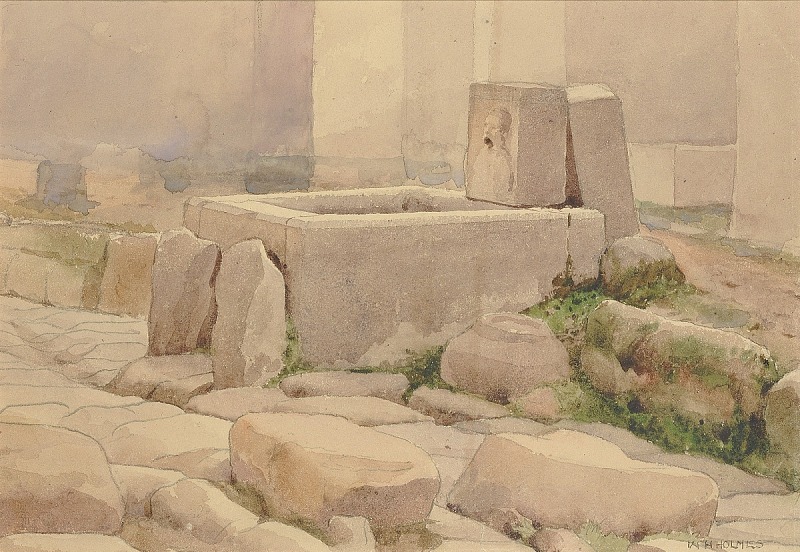 the image is a watercolor painting depicting an ancient stone fountain surrounded by rocks and stone structures. the fountain is rectangular with a sculpted face on a stone block behind it. the surrounding area is filled with various sized rocks and stone fragments, with some grass growing between them. in the background, there are weathered stone buildings. the overall scene conveys a sense of antiquity and historical architecture.