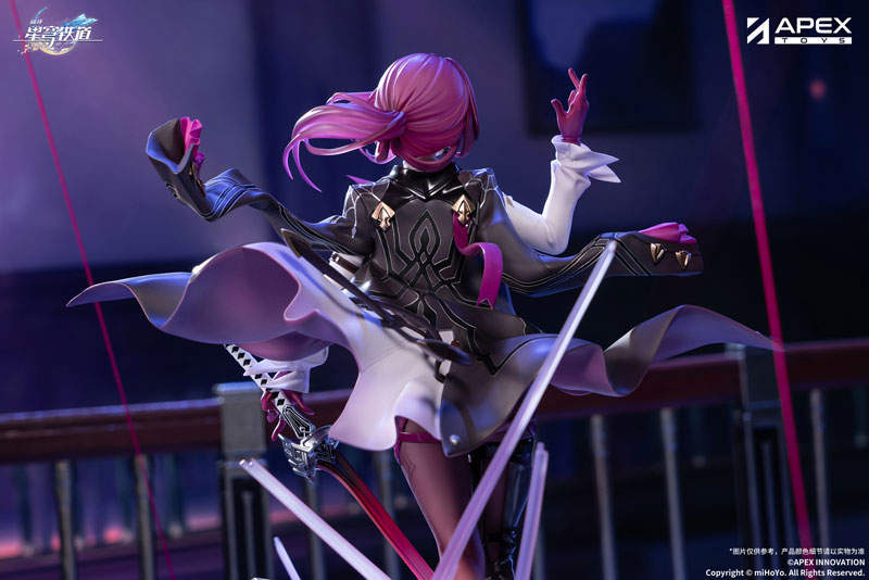 this is a promotional image of an apex toys figure of kafka from the video game honkai star rail. kafka is depicted wearing her signature black and white outfit, with her flowing hair and multiple swords surrounding her.