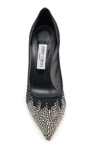 a top down view of a pair of black jimmy choo pumps with pointed toes and a delicate, sparkling rhinestone design.