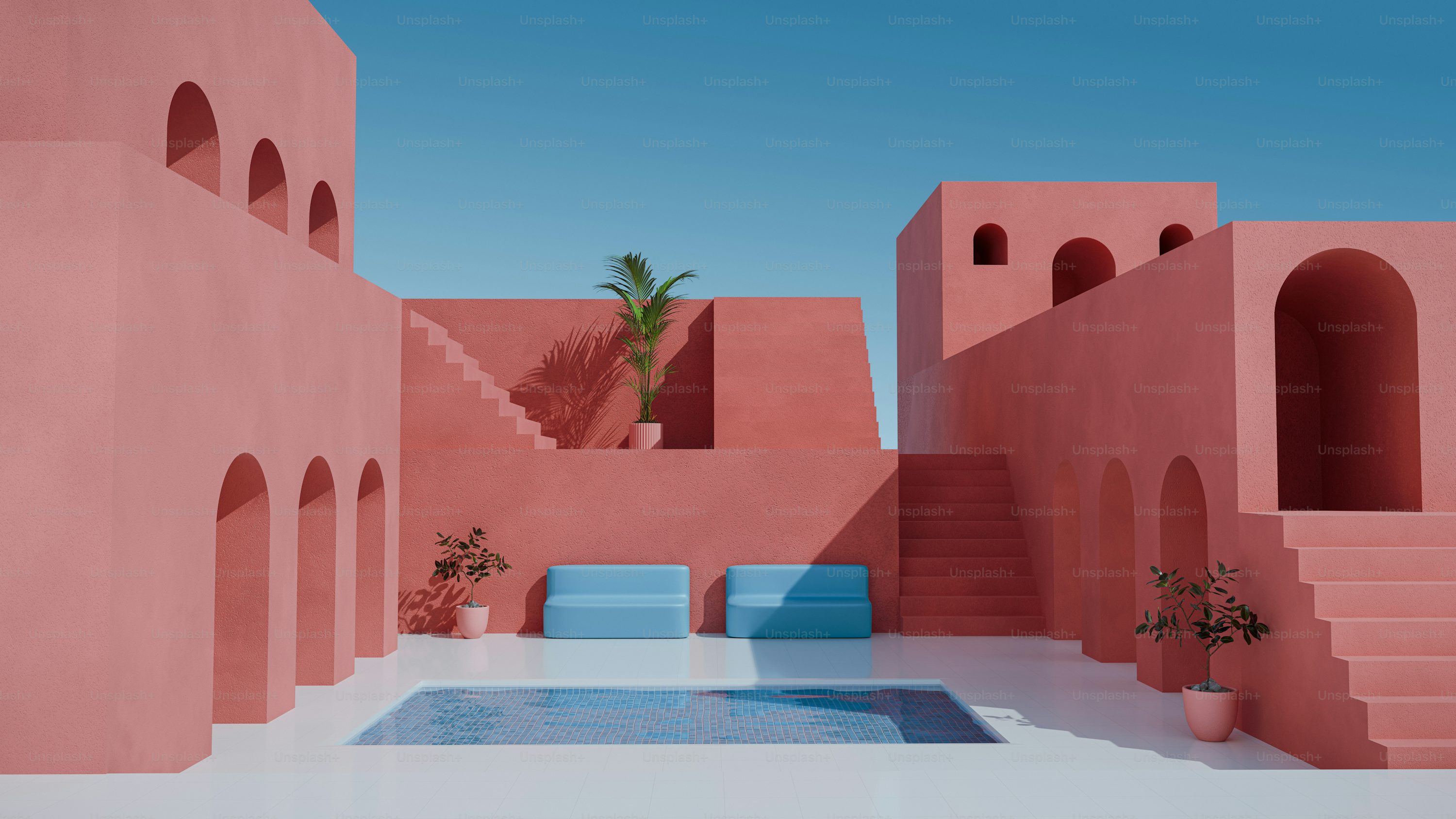 the image is a 3d rendering depicting a minimalist architectural design.  the scene is dominated by a coral pink color palette, featuring clean geometric shapes and structures.  the buildings have various archways and staircases leading to different levels. a small rectangular swimming pool is centrally located in a courtyardlike space.  tropical plants and succulents add to the tranquil atmosphere. the overall aesthetic suggests a modern and luxurious outdoor space, possibly part of a resort or highend residential property. the bright blue sky provides a strong contrast to the pinkishcoral tones.