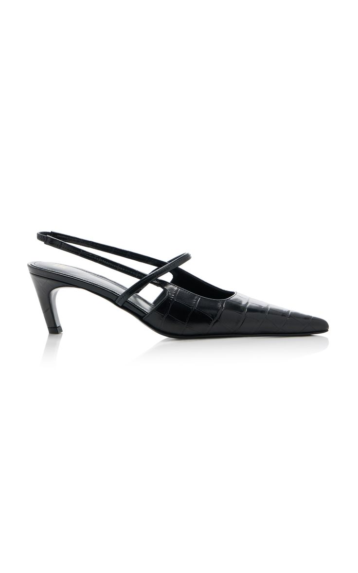 a black leather high heeled pump with a pointed toe. the shoe has a slingback strap that wraps around the ankle and has a delicate cutout design.  the shoe is elegant and stylish, perfect for a formal event or occasion.