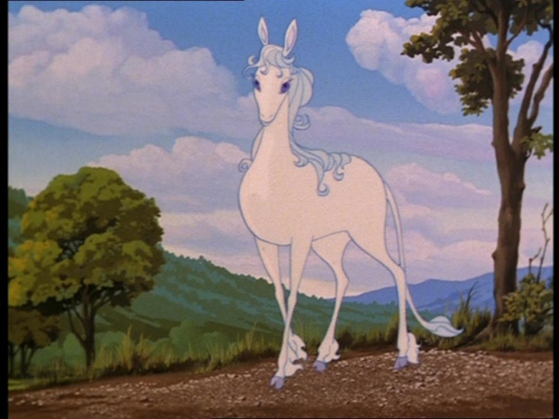 a white unicorn with a light blue mane and tail stands on a dirt path in a lush forest setting. the unicorn has a majestic and serene demeanor. the background features a blue sky with fluffy clouds, green rolling hills, and distant mountains. the scene evokes a sense of wonder and enchantment.