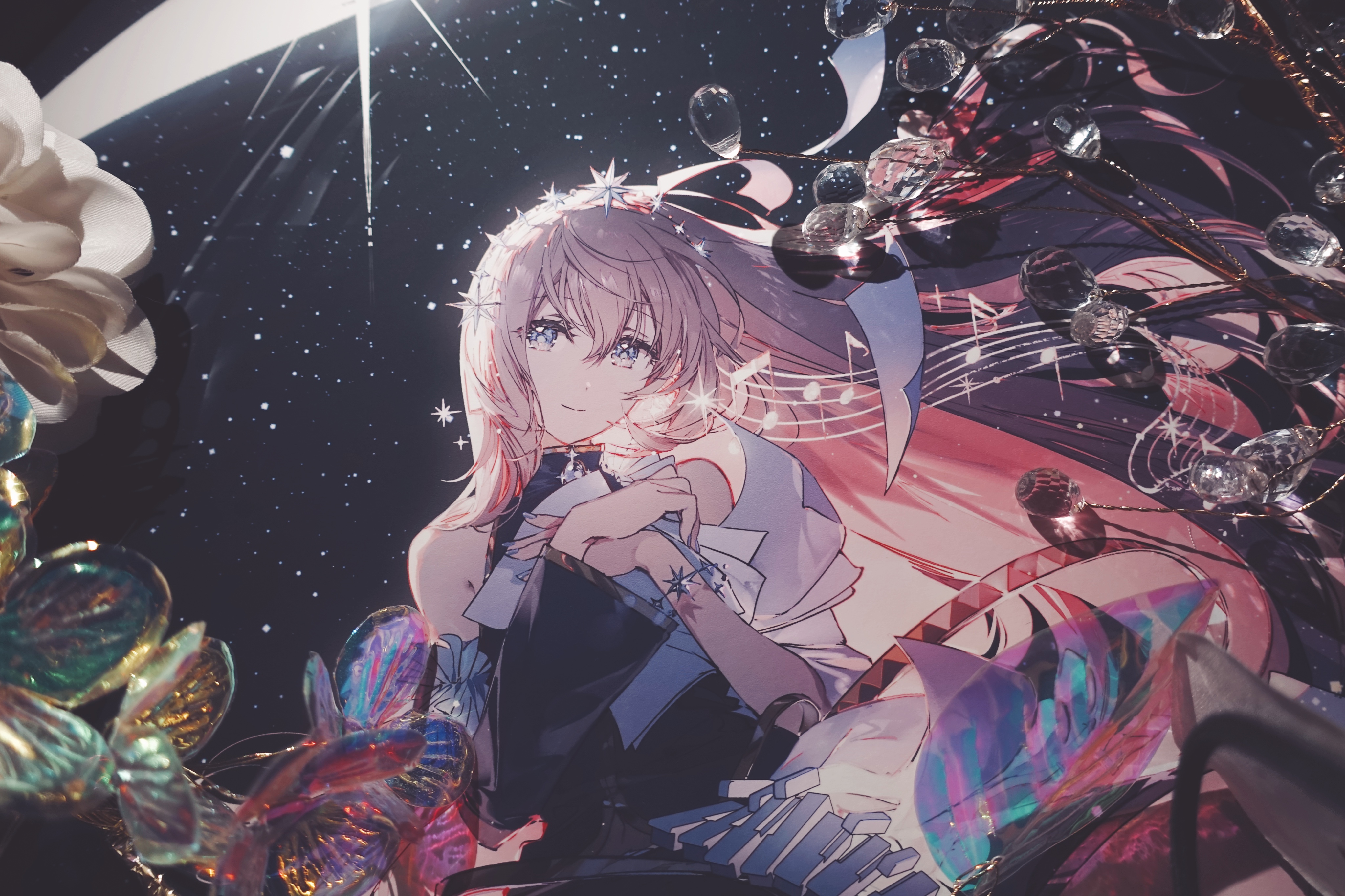 the image features a digitally illustrated animestyle woman against a dark background with stars, creating a celestial atmosphere. she has fair skin, light pinkishblonde hair adorned with starshaped accessories, and blue eyes. she is wearing a dark sleeveless dress with white and blue accents. the illustration is embellished with transparent crystals hanging from thin wires, floral arrangements, and a musical theme with music notes. the woman is depicted as playing a keyboard, further enhancing the artistic and imaginative composition. the overall effect is magical and dreamlike.