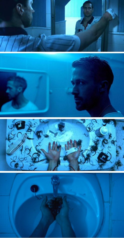 a man stands in front of a mirror in a bathroom, looking at his reflection. he has a towel wrapped around his head, and his hair is cut short. the sink is full of hair and water, and the faucet is turned on. the man's hands are visible in the sink, as if he is washing his hands. the bathroom is decorated in blue tones.