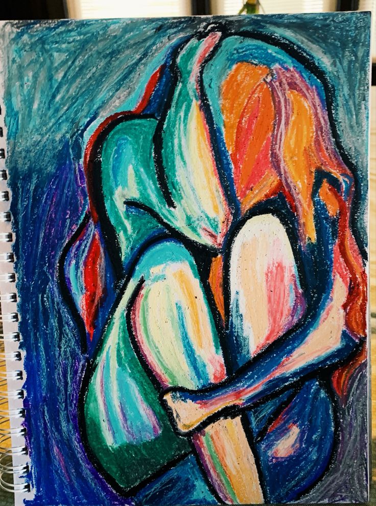 the image is a colorful abstract crayon drawing of a person sitting with their arms wrapped around their legs. the figure is drawn in a style that is both expressive and evocative, with bold lines and vibrant colors. the overall mood of the drawing is one of sadness and loneliness, but there is also a sense of hope and resilience. the artwork is a powerful and moving exploration of human emotion.