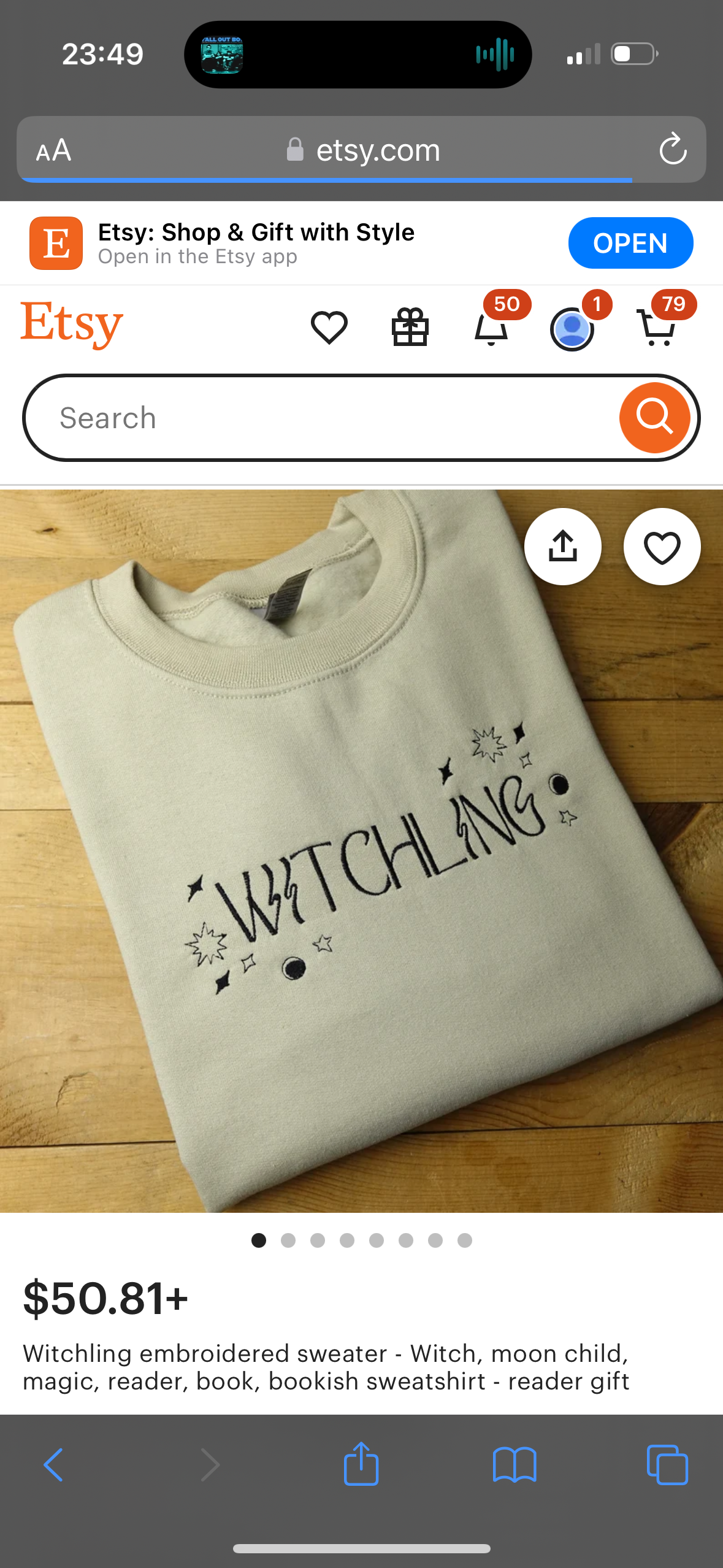 this is an image of a witchling embroidered sweater for sale on the etsy marketplace. the sweater is beige in color and has black embroidery with the word "witchling" in a cursive font. the sweater is pictured on a light wood background. the bottom of the image shows the price of the sweater, a description of the sweater, and navigation buttons.