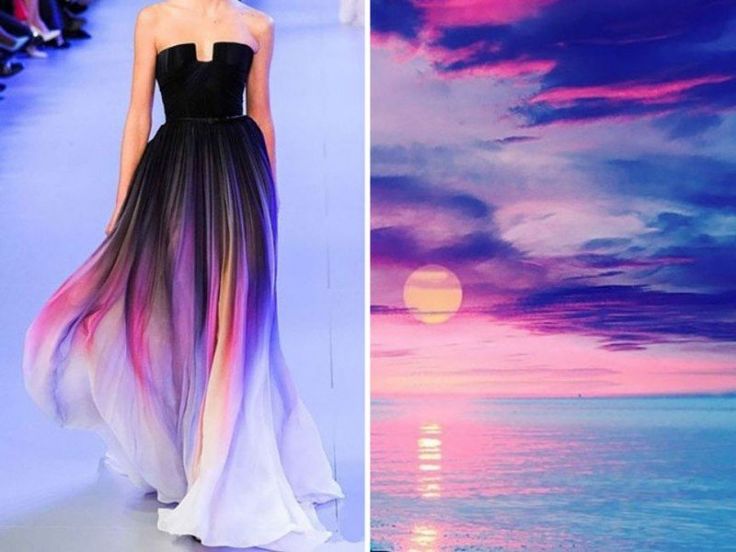 the image shows a model wearing an ombre dress in a fashion show setting. the dress is black at the top and gradually fades into purple, pink, and white at the bottom. it's similar to a sunset over the ocean. the dress is very flowy and it looks like a cloud on the other side of the image. the model is walking on a runway with a backdrop of a blue sky and a blue and white floor.  on the right side of the image, the backdrop is a gorgeous sunset over the ocean. the ocean is a soft blue and pink, and the sky is a mix of pink, purple, and blue. the sun is setting in the distance, and there are clouds in the sky. the whole image is very beautiful and evokes a sense of peace and tranquility.