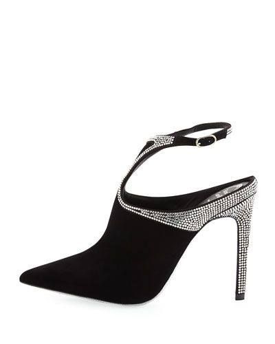 a black high heel shoe with an ankle strap is shown in a studio shot. the shoe has a pointed toe and the heel and ankle strap are embellished with rhinestones.