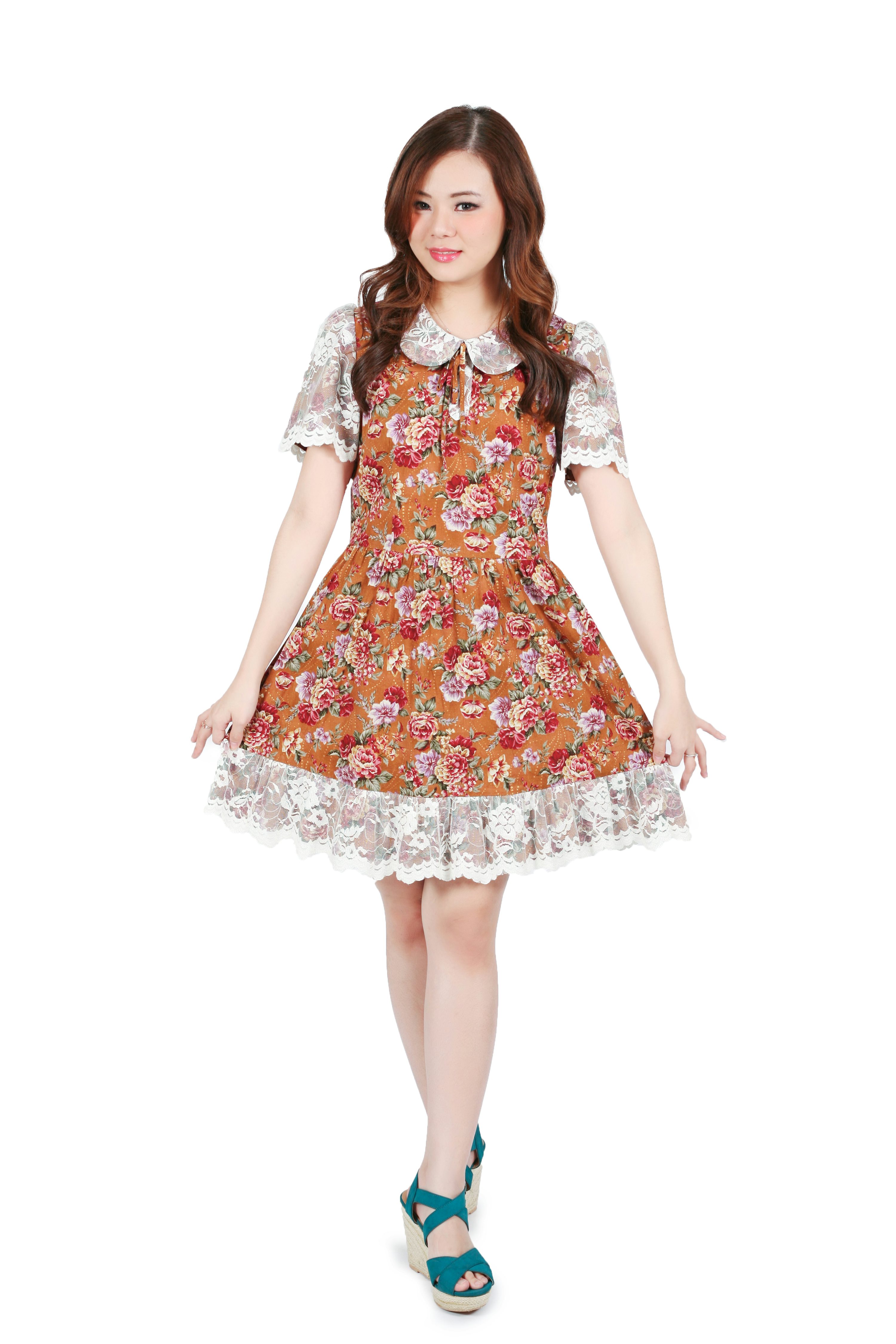 a young asian woman is standing in a brown floral dress with white lace trim.  she's smiling slightly and looking at the camera. she's wearing teal sandals. the background is pure white. the overall style is cute and feminine.