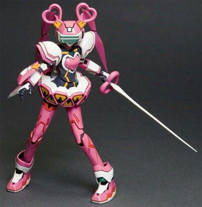 a pink anime robot girl action figure with a sword. the robot has a pink and white body with yellow and red accents. she is wearing a short pink skirt and has long pink hair. she is holding a white sword in her right hand. the figure is standing on a grey background.