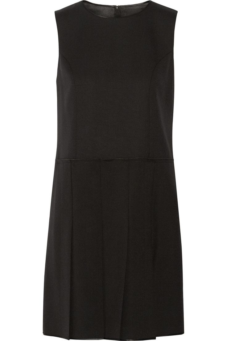 a black sleeveless dress with a plain top and a pleated skirt.