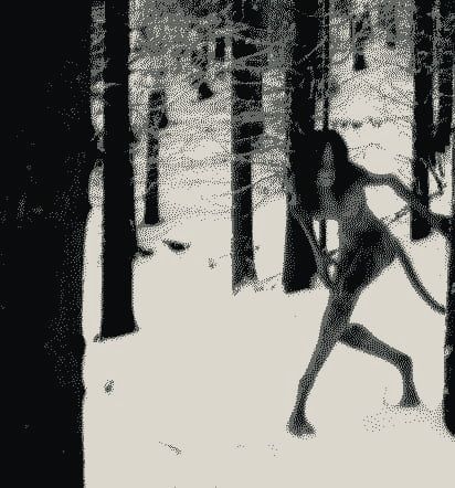a grainy, black and white image depicts a dense forest covered in snow. silhouetted trees stand tall, and in the midst of them is a strange, perhaps monstrous, creature with a humanoidlike form. its posture is awkward and distorted, suggesting movement or a struggle within the wintry landscape. the overall image is unsettling and evokes a sense of isolation and danger.