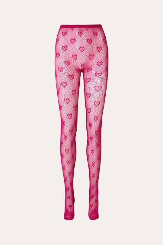 the image shows a pair of pink fishnet tights with a heart pattern. they are displayed against a plain background.