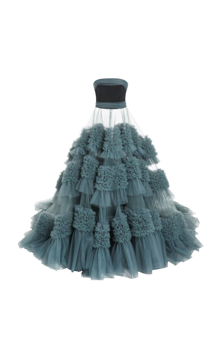 a strapless teal tulle gown with layers of ruffles. the gown has a black strapless bodice.