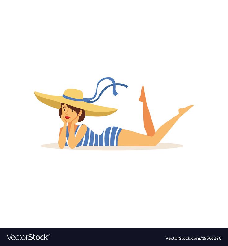 a young woman wearing a striped swimsuit is sunbathing on the beach. she is wearing a straw hat and is lying on her stomach with her head resting on her hands.  she is enjoying her vacation time and the summer sun.