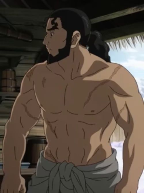 the image depicts a muscular, shirtless man with dark hair and a beard pulled back in a ponytail. he is standing in profile, facing left, revealing numerous scars across his torso and arms. the man appears to be inside a simple wooden structure, possibly a hut or cabin, with a white towel wrapped around his waist. the setting is brightly lit, likely by natural light streaming in from an unseen opening, casting soft shadows across his body. his expression is serious and focused.