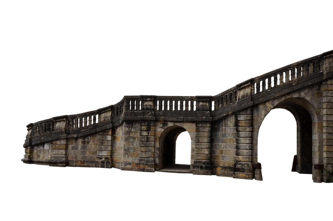an old stone bridge with multiple arches and a staircase along the top. the structure has a weathered look, and a railing runs along the top of the staircase. the background is black.