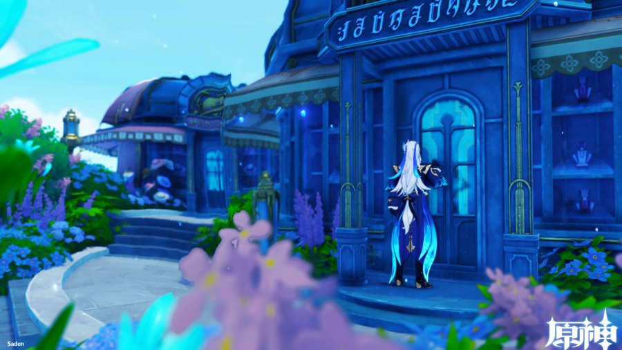 the image is a screenshot from the video game genshin impact. it showcases a character, likely aether judging by the clothing style, standing in front of a charming, bluetoned shop. the shop has ornate detailing and displays various items within. the setting is fantastical, filled with vibrant purple and blue flowers. the overall aesthetic is whimsical and magical. the background suggests a larger outdoor area with more buildings and nature elements. the scene is brightly lit and showcases the game's highquality graphics and art style. the chinese characters on the shop sign likely indicate the name of the establishment.