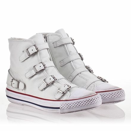 a pair of white high top sneakers with buckles on each side.