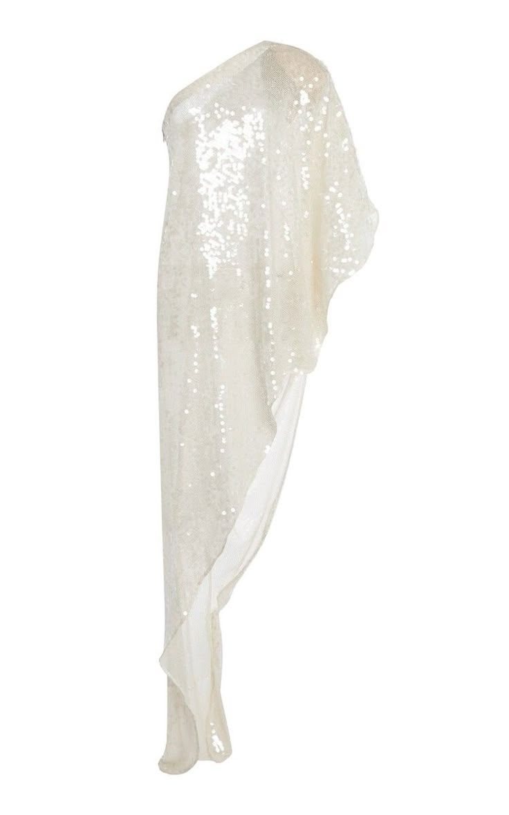 a floorlength, oneshoulder gown covered in white sequins is isolated on a white background.