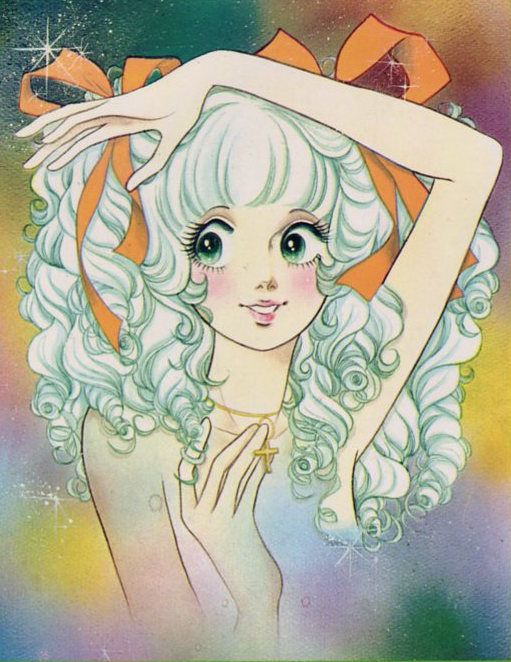 an anime style portrait of a girl with light turquoise curly hair adorned with orange bows. she has large green eyes, rosy cheeks, and is wearing a gold necklace with a cross pendant. her hands are posed delicately, and she is set against a rainbowcolored background.