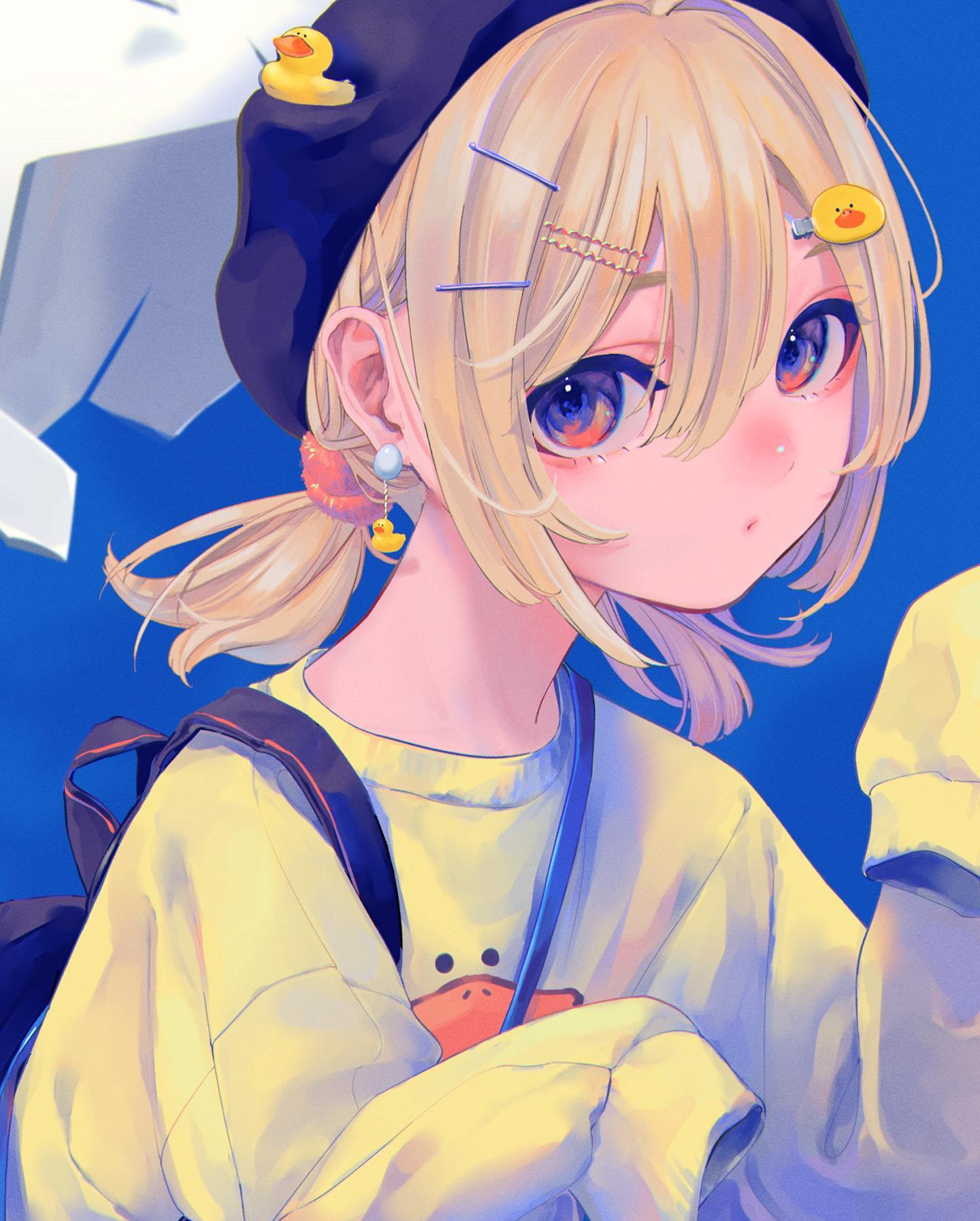 he image is a digital illustration of a cute anime girl. she has long blonde hair styled in a bob with a small ponytail. she's wearing a yellow sweater, a dark blue beret adorned with small yellow duck figurines, and earrings that also feature ducks.  she carries a darkcolored backpack strap and has hair clips in her hair. the art style is soft, pastelcolored, and gives a kawaii, or cute, impression. the background is a simple blue. the overall style is reminiscent of modern anime illustration.