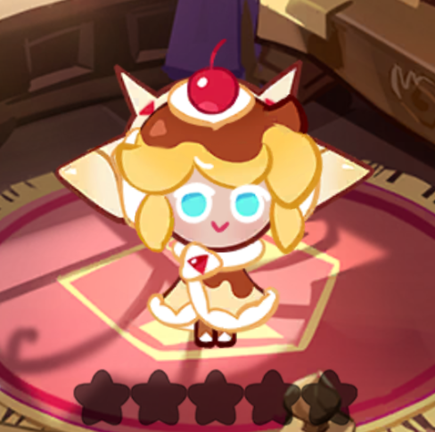 a closeup of the video game character panna cotta cookie from the cookie run series. the character is a cookie with tan skin, blue eyes, a smile, and blonde hair. it is also wearing what appears to be a dessert or pastryinspired outfit. the character is on a rug with a background of furniture and the image also shows a star rating at the bottom, with three dark stars and one gold, almost full.