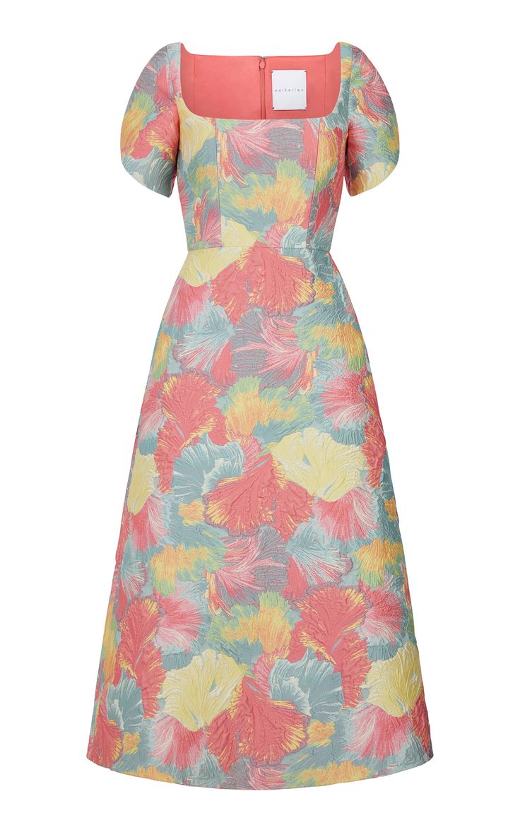 a vibrant floral midi dress with a square neckline, puff sleeves, and a flattering aline silhouette. the dress is made of a lightweight fabric and features a colorful print in shades of pink, blue, yellow, and green. it is a perfect choice for a summer party or a special occasion.